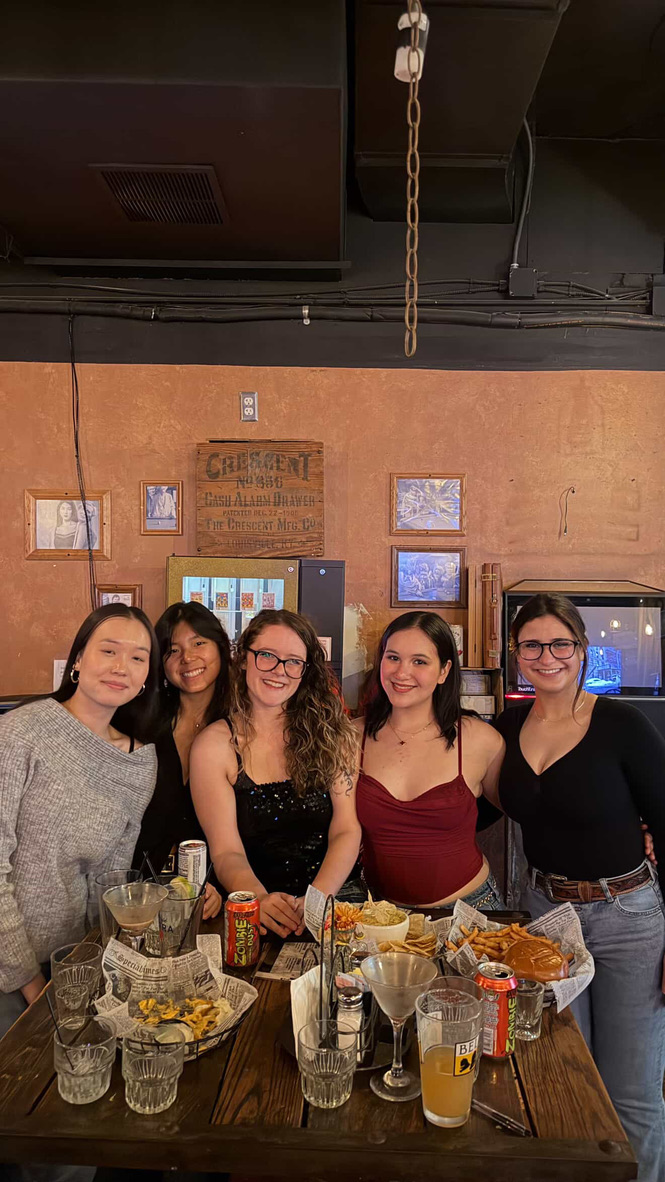Katie with friends at dinner.