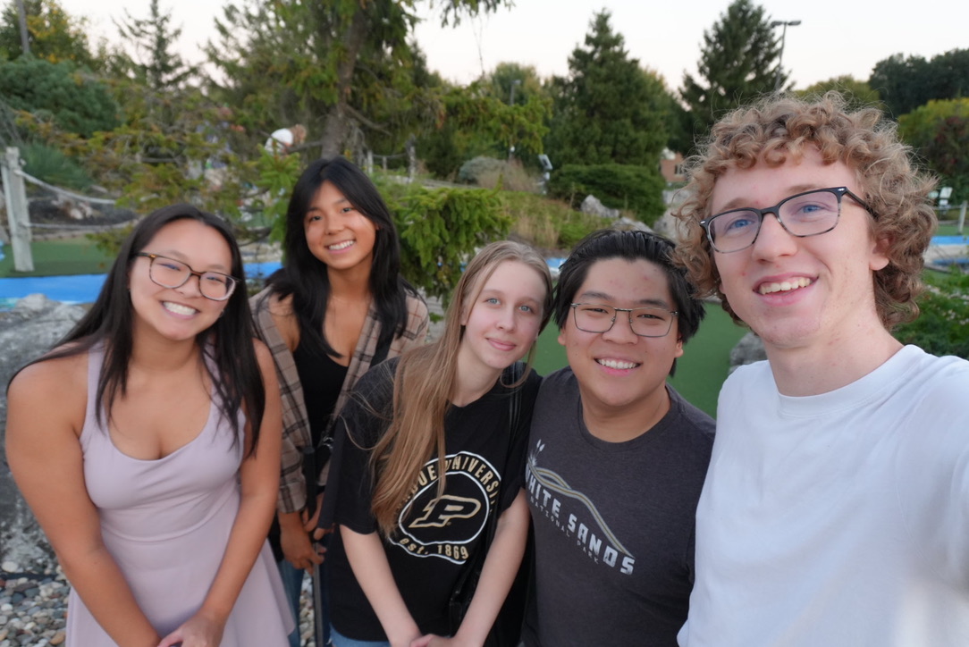Katie with friends at mini golf.